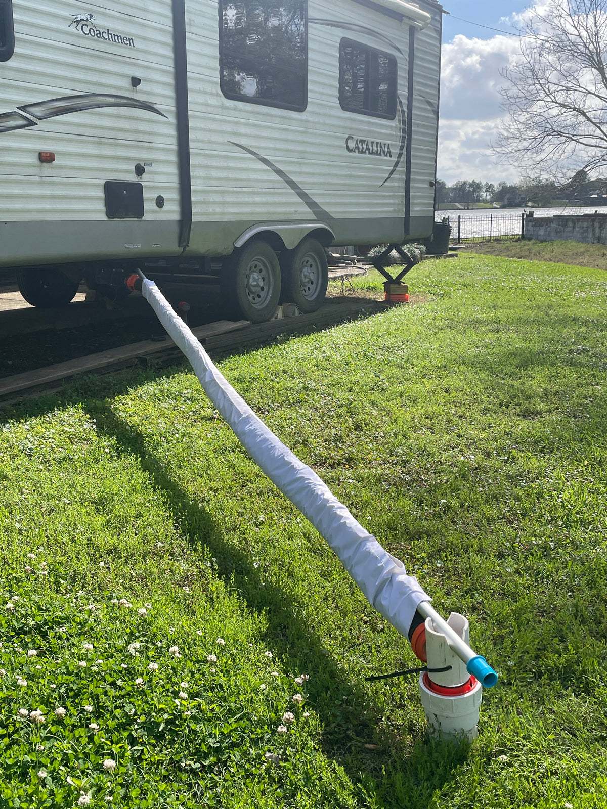 15 ft Levitator running downhill from a Catalina travel trailer to the sewer connection